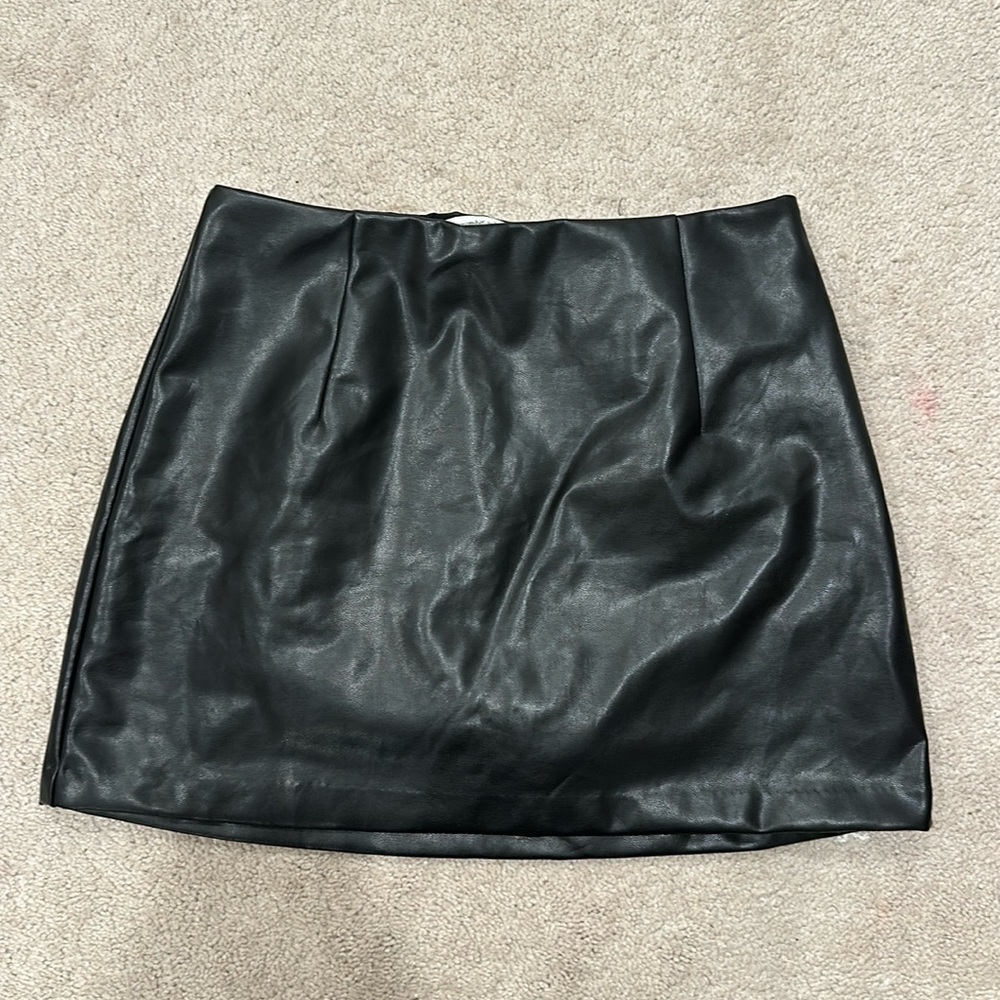 Black vegan leather Abercrombie skirt. Size medium. Worn a few times.
